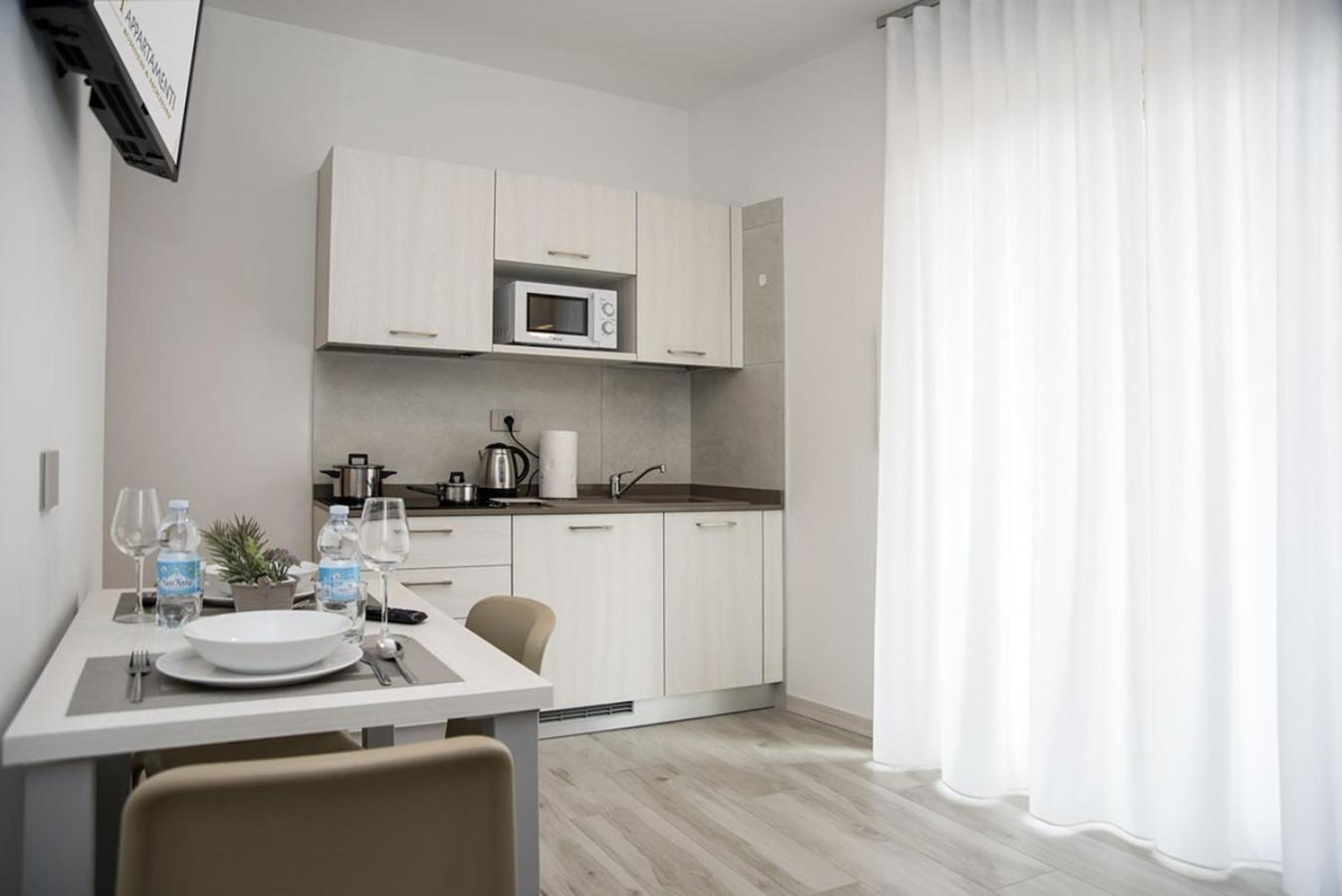 Camelot Appartamenti - Business E Holiday Сан-Мартино-Буон-Альберго Экстерьер фото
